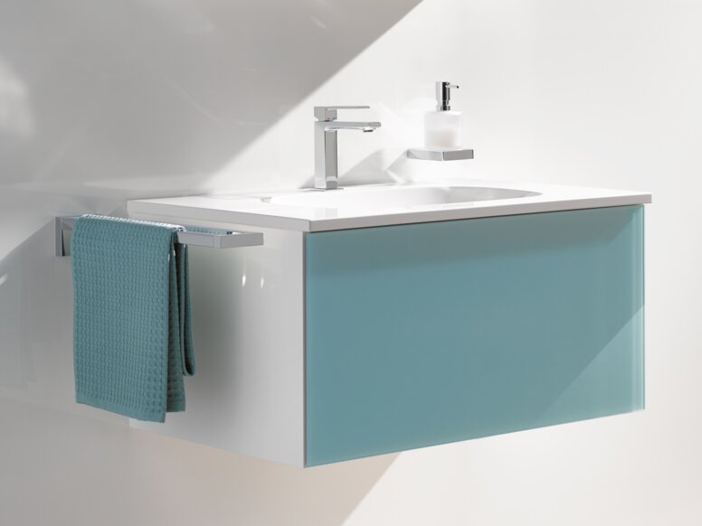 Mirror cabinet and washbasin in the colour aqua blue